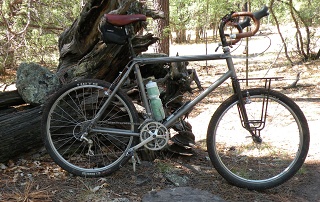 DBR (Diamond Back Racing) US made Ti MTB; custom steel fork; customized Bruce Gordon front rack; Zuni Mountains, circa 2018.