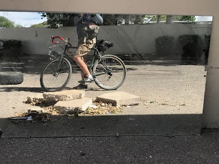 Abandoned or trashed mirror, ABQ NM; Black Mountain rim brake cross; experimenting with a new-to-it front basket. 