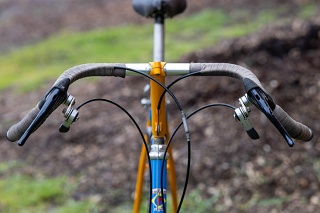 A Salsa with Wilderness Trail Bike drop handlebars and earlier WTB shifter mounts for Suntour friction thumb shifters. (This is not one of my bikes.)