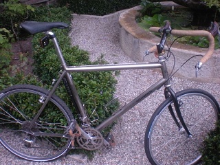 Titanium drop bar MTB in road ride mode. Leather brake hoods feel better than rubber. Despite the decal, it's not a Schwinn. Bought new in early 1991. Note the Salsa upjutter, designed (like the Ibis LD) specifically to put drops on MTBs.  